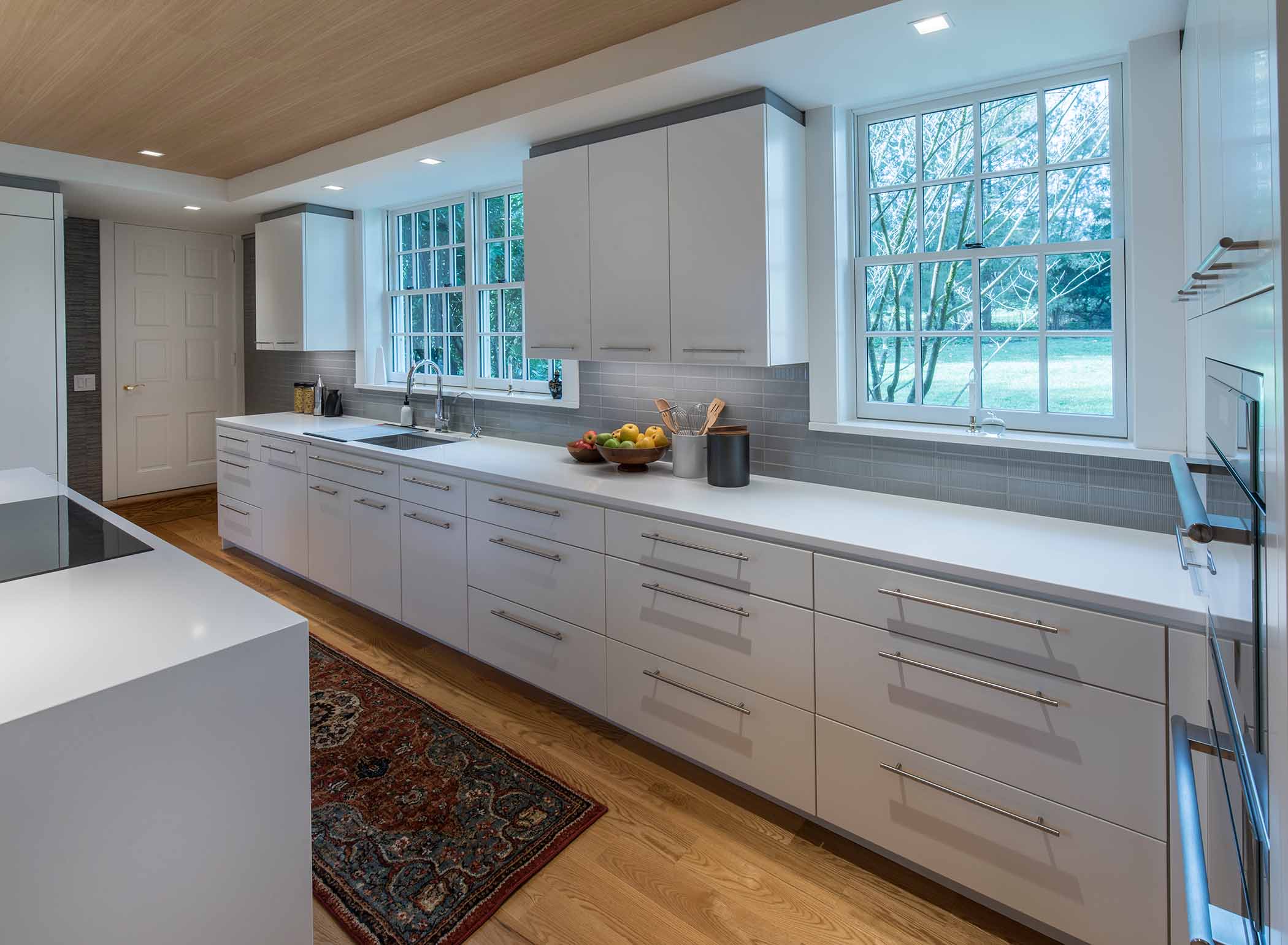 expansive kitchen counter with large windows