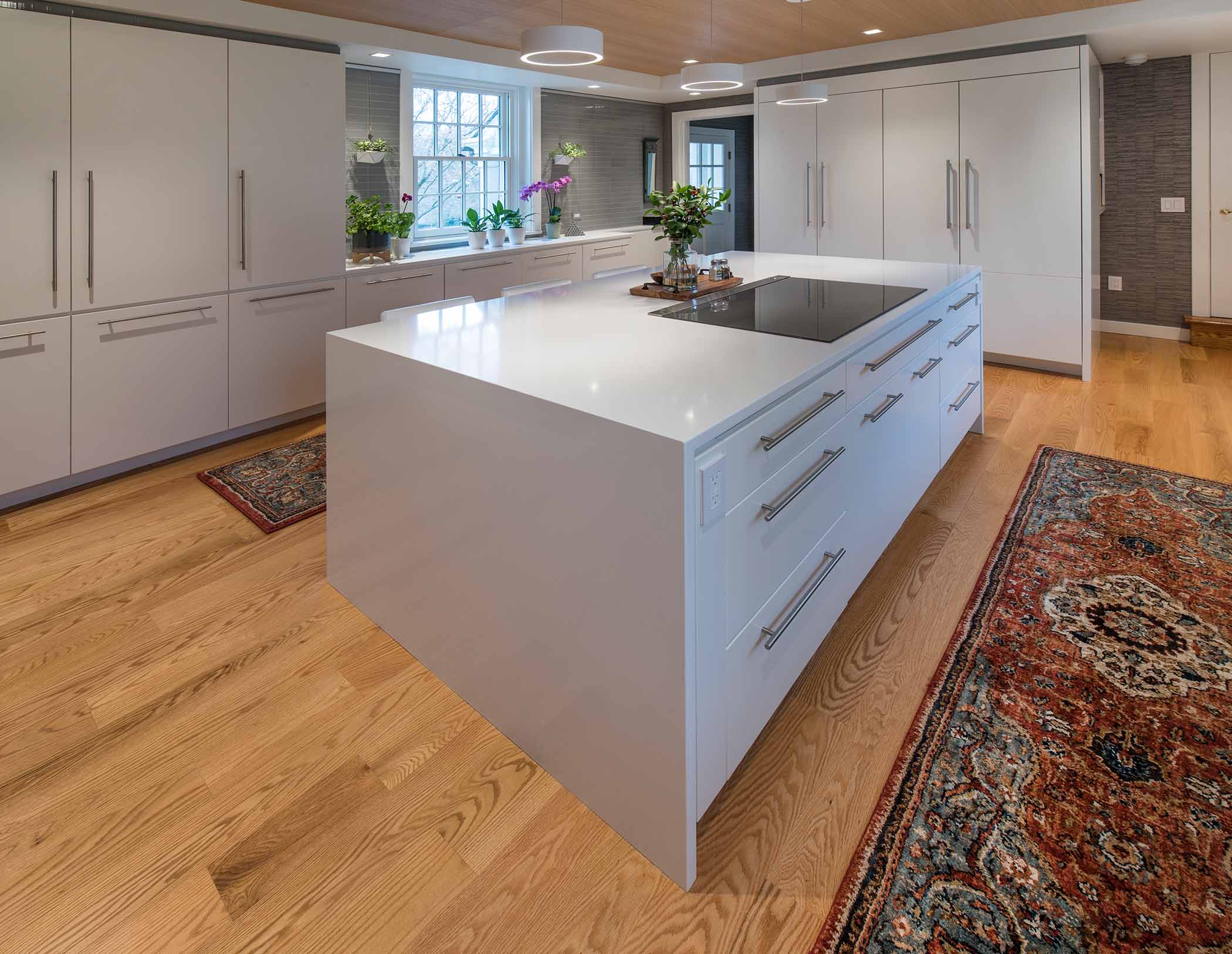 kitchen island with wood flooring