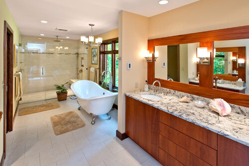 luxurious master bathroom with free standing tub and double vanity