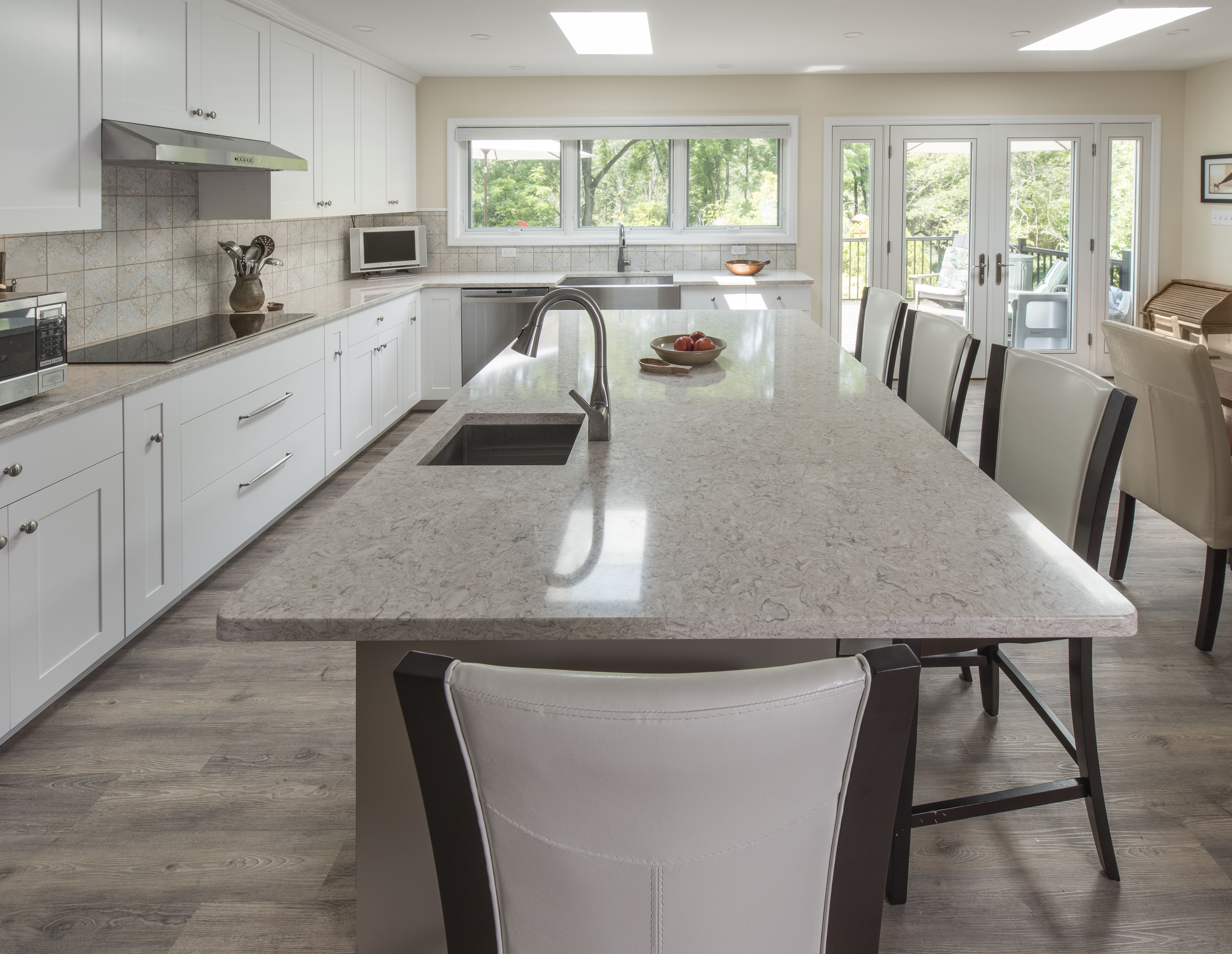 all white cabinets and countertop by Penn Contractors