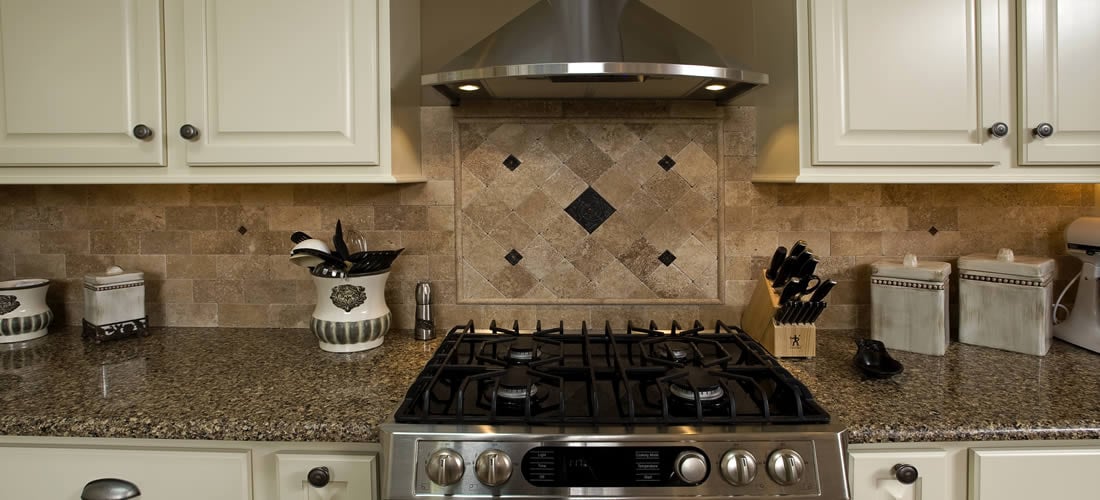 Contemporary Kitchen Remodel, stainless steel gas range with matching exhaust hood